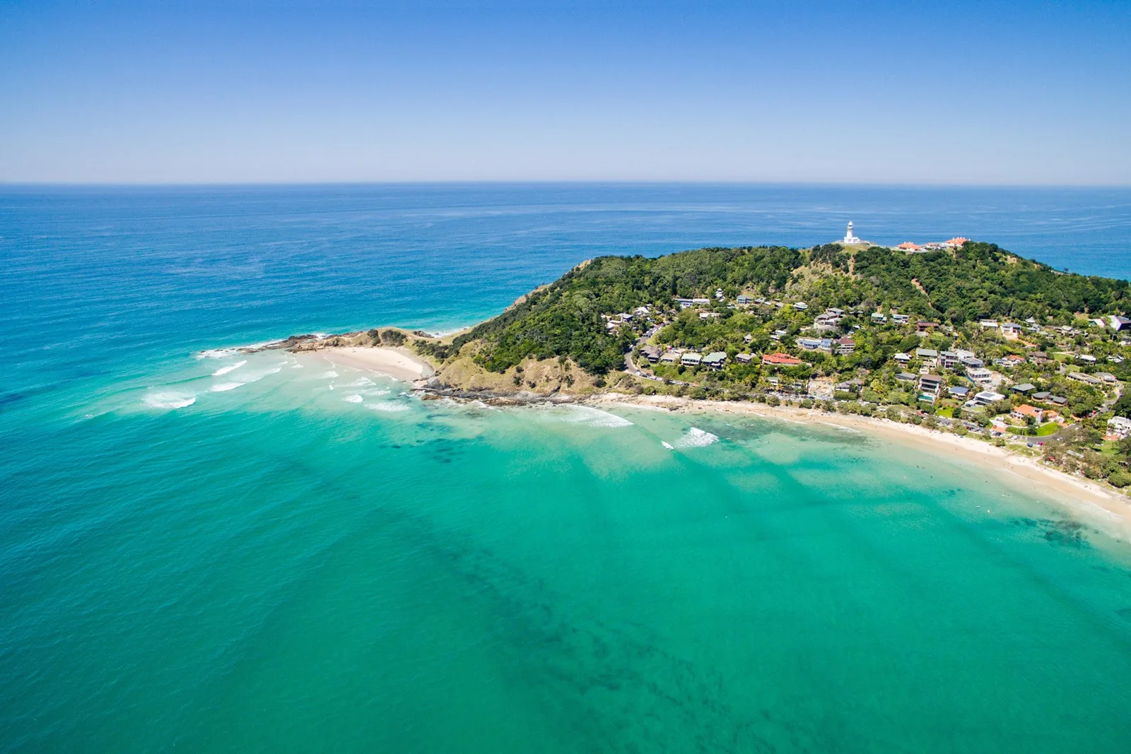 Aerial view of Wategos Beach and the homes around the Cape Byron headland