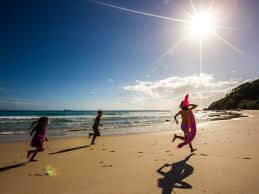 Kids playing at the beach